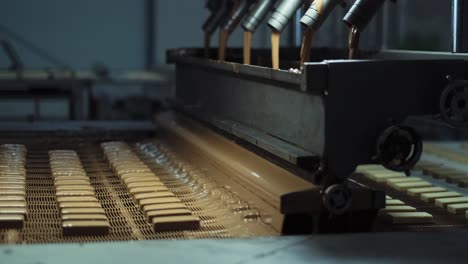 Desserts-on-conveyor-belt-in-wafer,-biscuit,-cake-factory