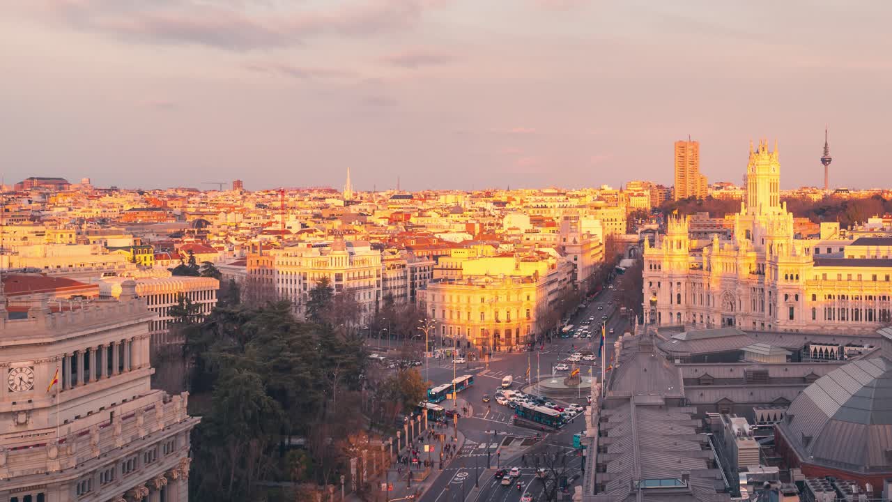 Madrid Alcala street Cibeles and Town Hall during sunset timelapse day to night aerial view