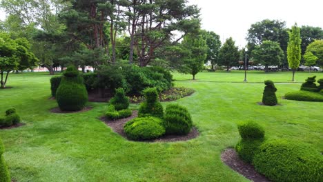 topiary park in columbus, ohio's, officially the topiary garden at old deaf school park, depicts figures from georges seurat's 1884 painting, a sunday afternoon on the island of la grande jatte