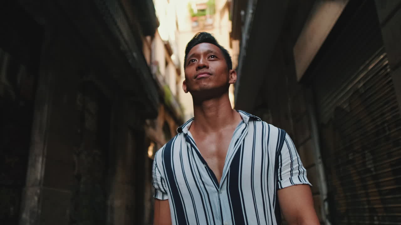 Man walking in an urban alley