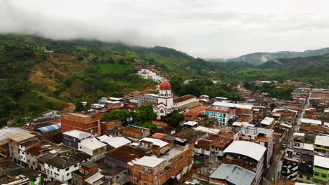 aerial view away from the saint raphael's church in cloudy san rafael, colombia