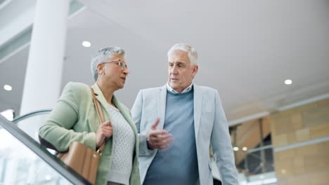 Escalator,-travel-and-business-people-talking