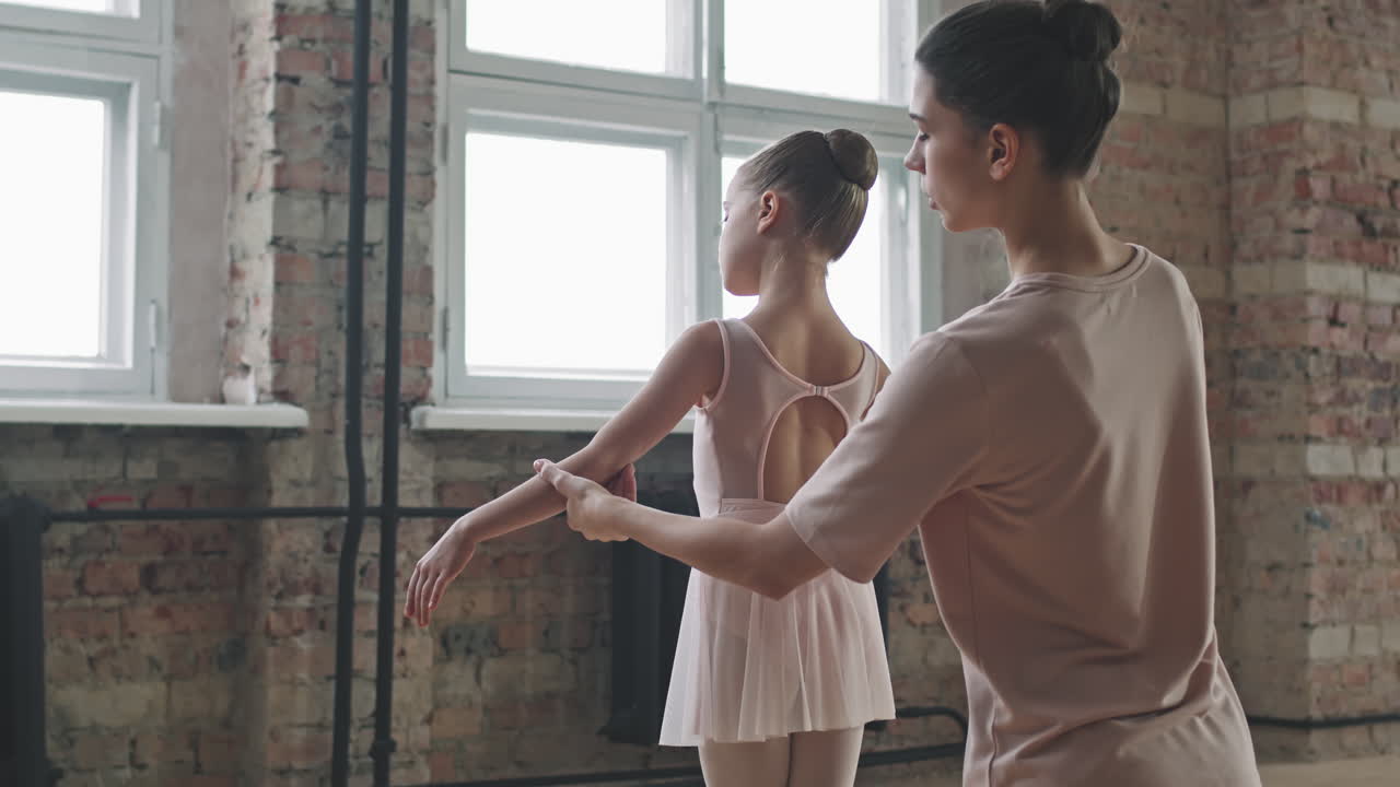 Little Girl Standing In Ballet Pose