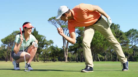 golfers playing golf