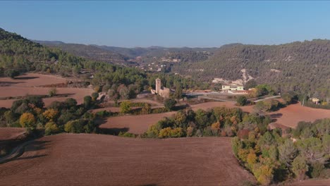 Sant-Esteve-de-Marganell-Hermitage-at-day-near-town