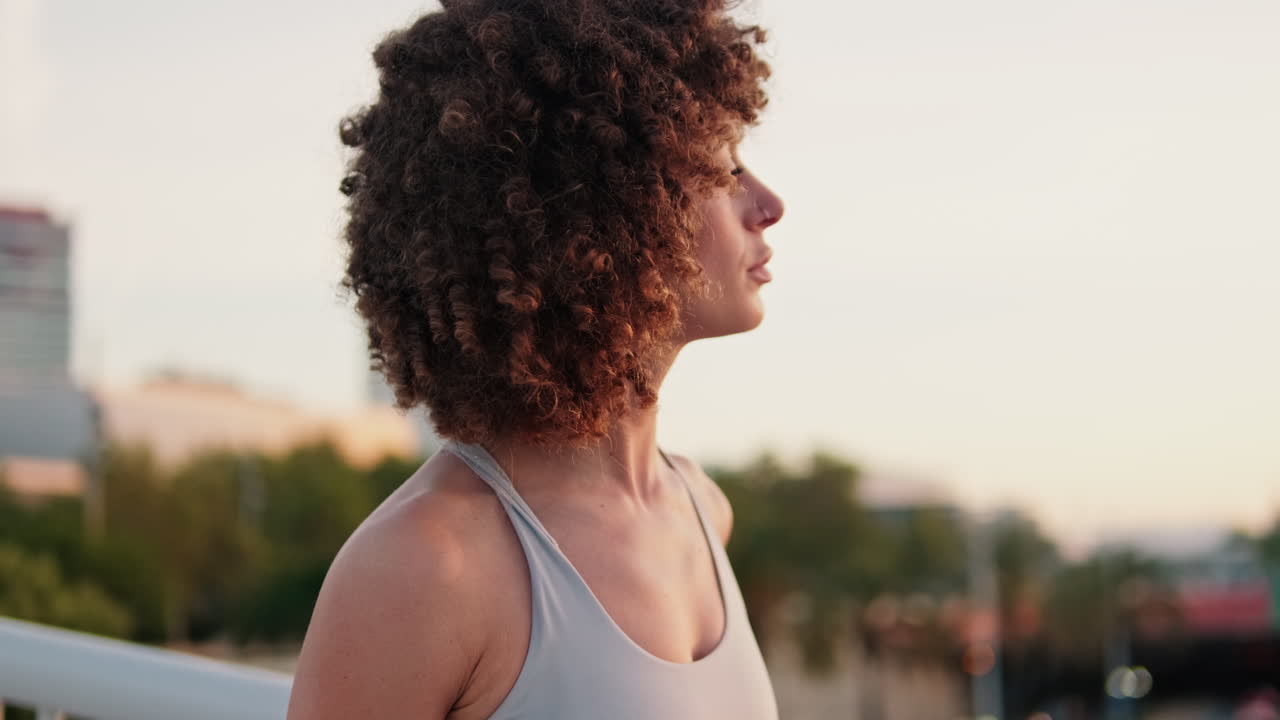 Young Woman Breathing on City Bridge Before Workout