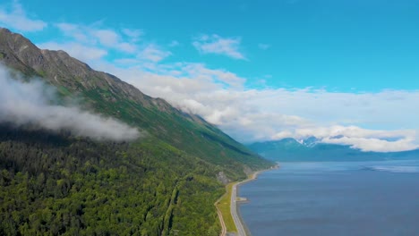 4k drone video of mountains and shoreline of kenai peninsula in summer