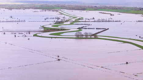 drone view of countryside flooding around river tone, somerset, uk