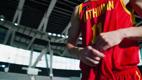 lithuanian basketball player in modern arena