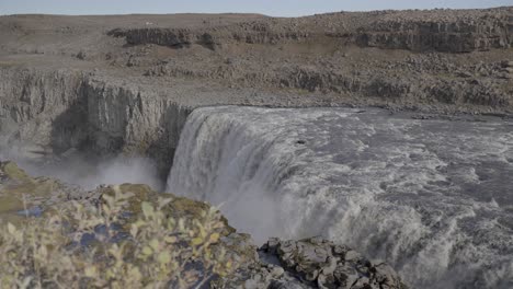 the cascading waters of dettifoss, a waterfall nestled in northeast iceland