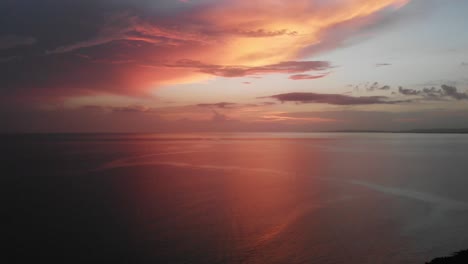 aerial shot of sunset with ocean