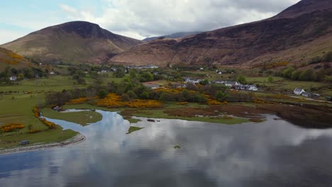 aerial view of the scottish town of lochranza on the isle of arran on an overcast day, scotland