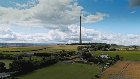 drone footage of emley moor transmitting station, is a telecommunications and broadcasting. the iconic concrete tower is 1 is a grade ii listed. it is the tallest freestanding structure in the uk