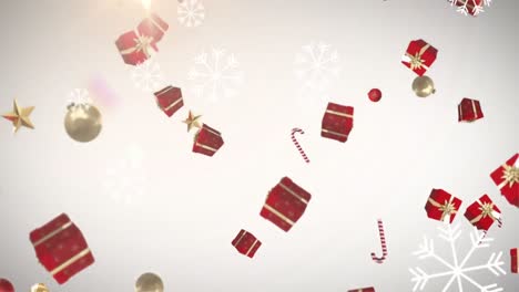 Snowflakes-and-multiple-christmas-concept-icons-falling-against-spot-of-light-on-grey-background