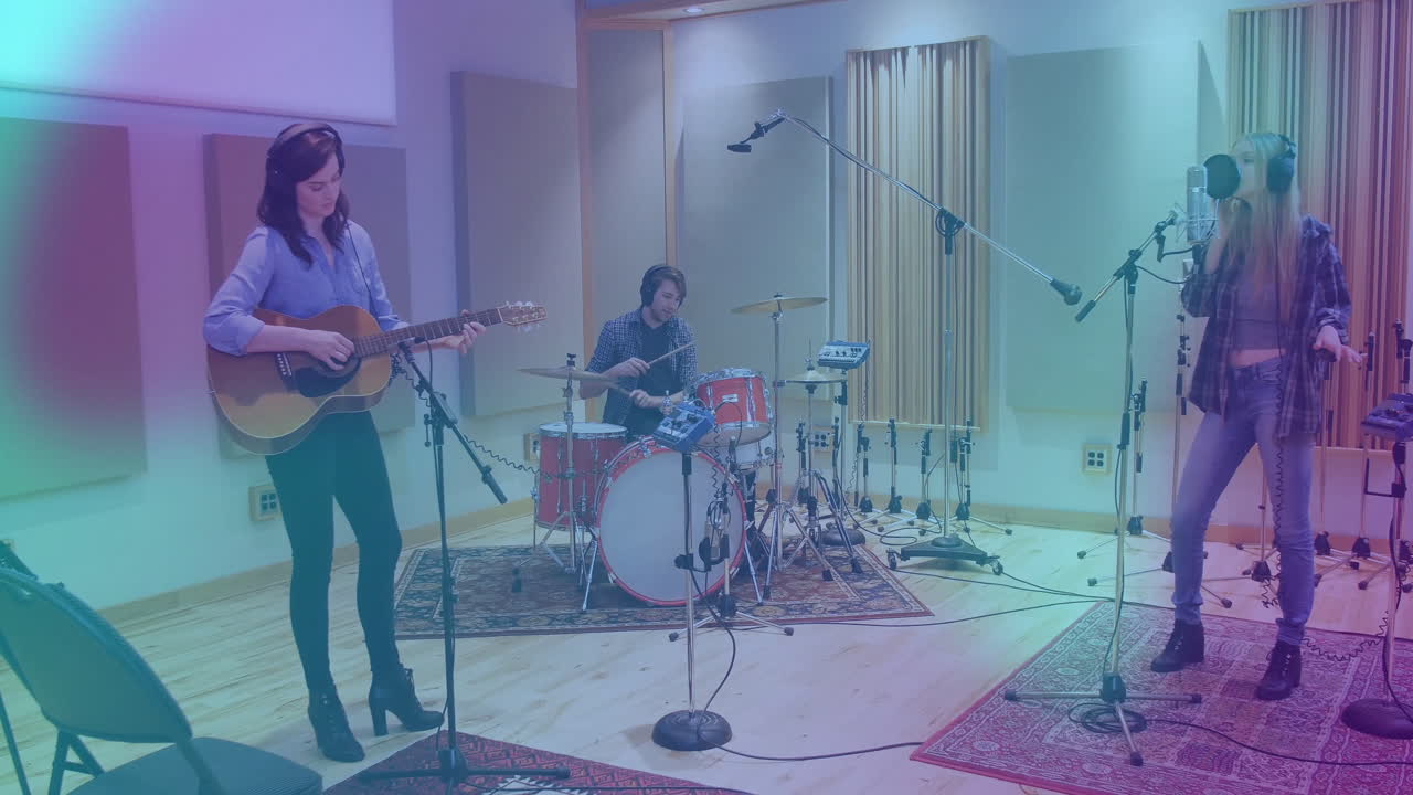 bandmates rehearsing in recording studio, with animated audio waves and mix graphs overlaying track