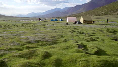 tilt up shot to a tent camp, called nimaling on the markha valley trek