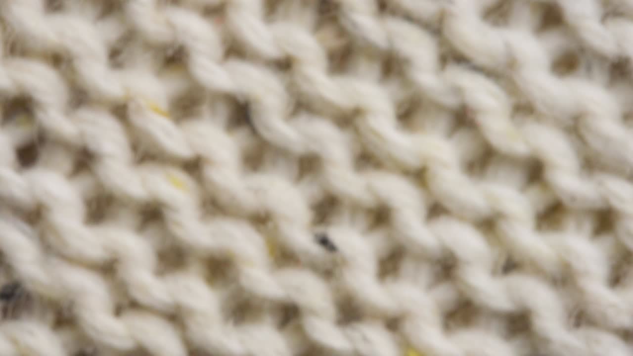 뜨개질 직물 스레드 매크로 베이지 스웨터