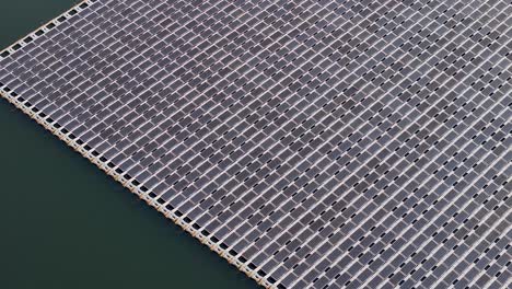 aerial view of a part of a massive floating solar grid on a lake in nj