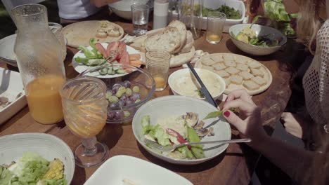 people eating tasty healthy food outdoor