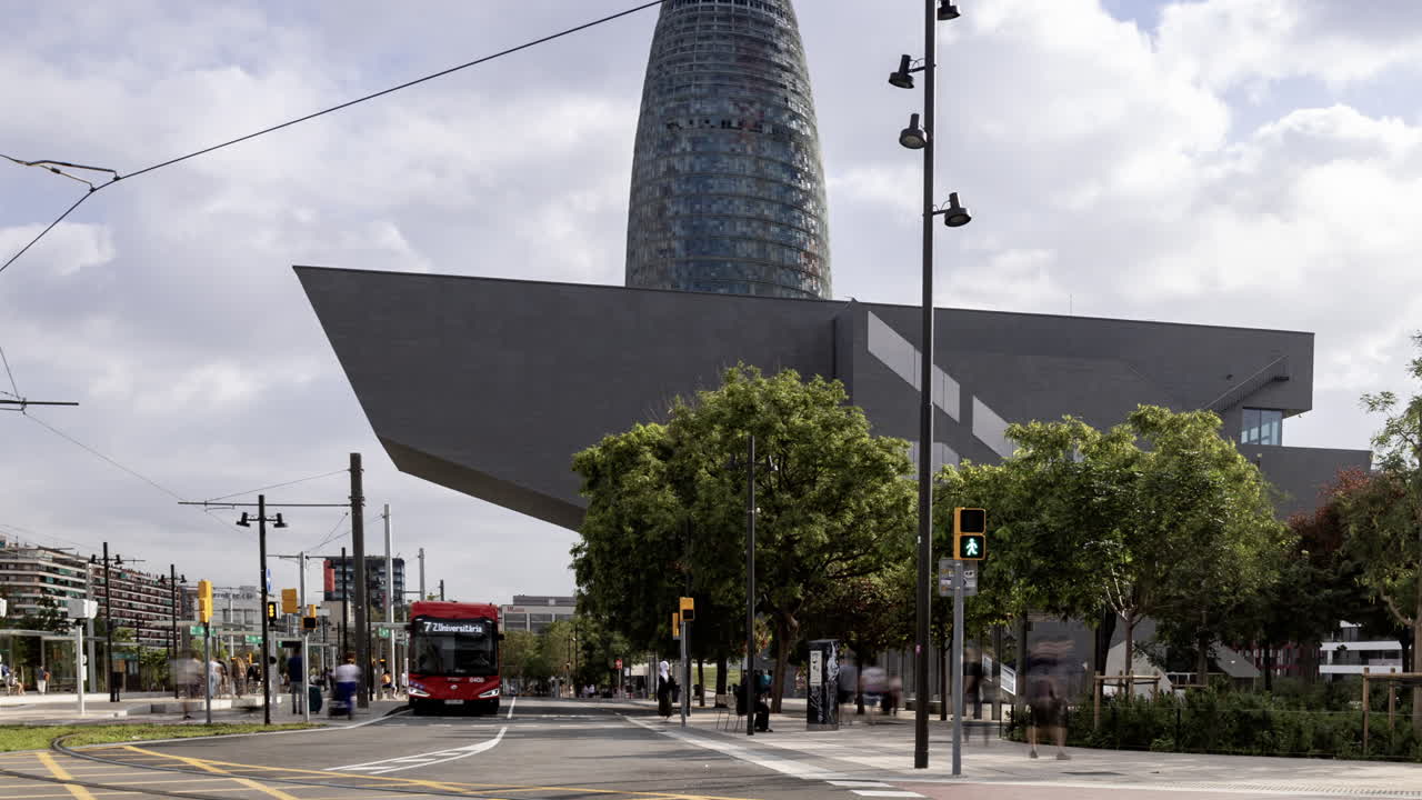 Timelapse of Glories Metro Station In Barcelona and skyline with rush of people and transport