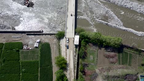 A-Top-Down-View-of-Laghman-Province's-Bountiful-Crops,-Rivers,-and-Bridges