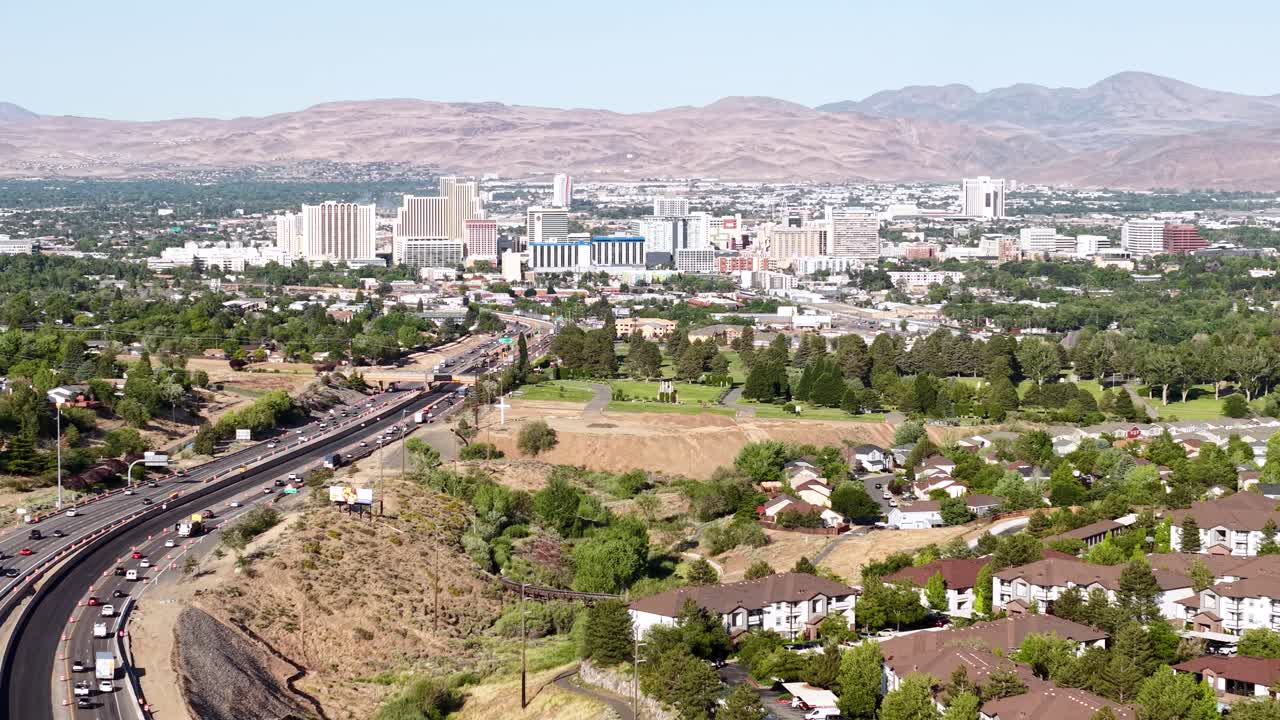 Reno, Nevada USA. Drone Shot of Downtown Buildings and Traffic on Interstate Highway