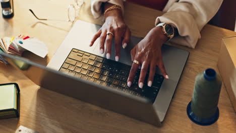 Top-view,-hands-and-business-woman-with-laptop