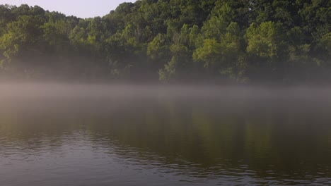 early morning fog on the chattahoochee river in roswell georgia