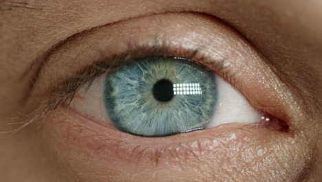 close up blue eye opening blinking natural beauty eyesight health concept