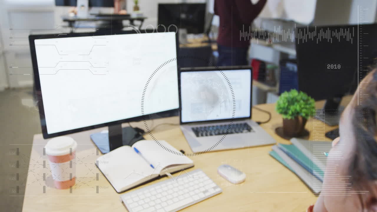 Animation of financial data processing over caucasian businesswoman in office