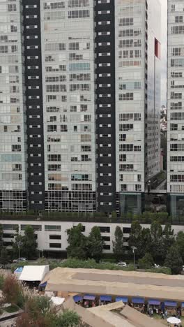 luxury apartment in santa fe area of cdmx, captured by drone, vertical mode