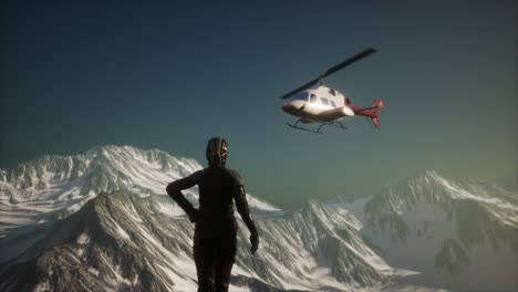 woman and helicopter in winter mountains