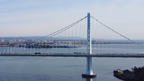 ascending aerial shots of the san francisco bay bridge