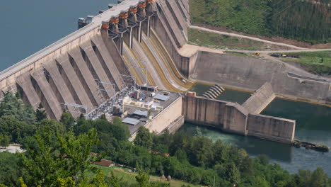 A-top-scenic-view-of-a-beautiful-hydroelectric-power-plant-in-rich-green-valley