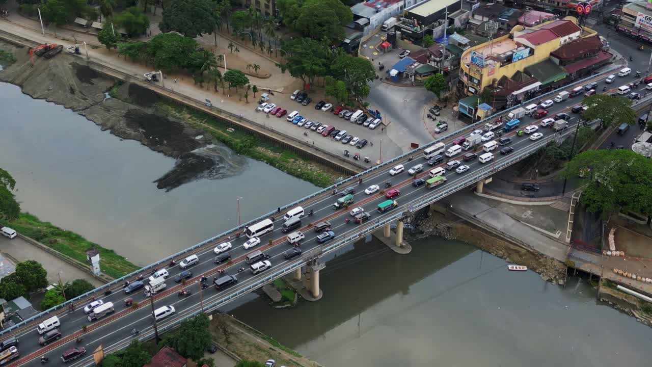 Heavy Traffic On Marikina Bridge Spanning Over Marikina River In Marikina City, Philippines. aerial shot