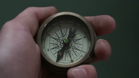 Holding-Old-Fashioned-Compass-4K