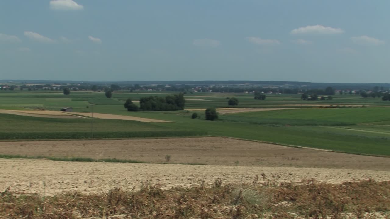 Beautiful pan shot over fields in Bavaria near Neuburg an der Donau in summer, Germany