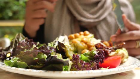 enjoying a fresh and healthy salad