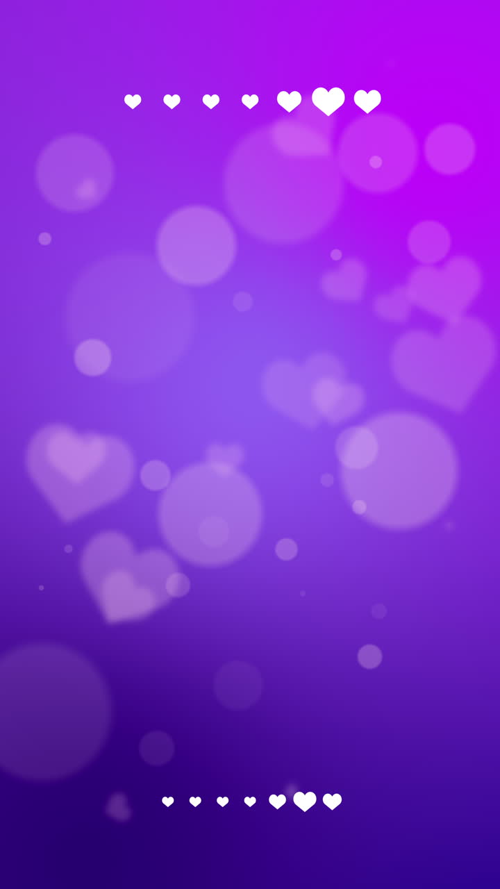 Purple bokeh background with flying hearts. Happy Valentines Day Card Design. 14 February. Loop blurred soft animated screensaver. Vertical video.