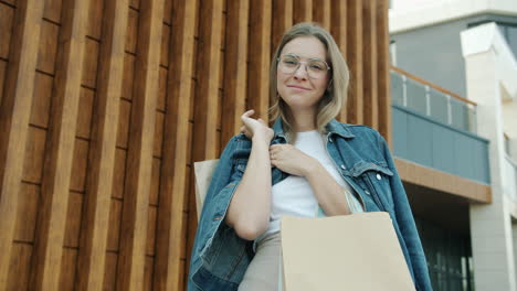 happy woman shopping outdoors