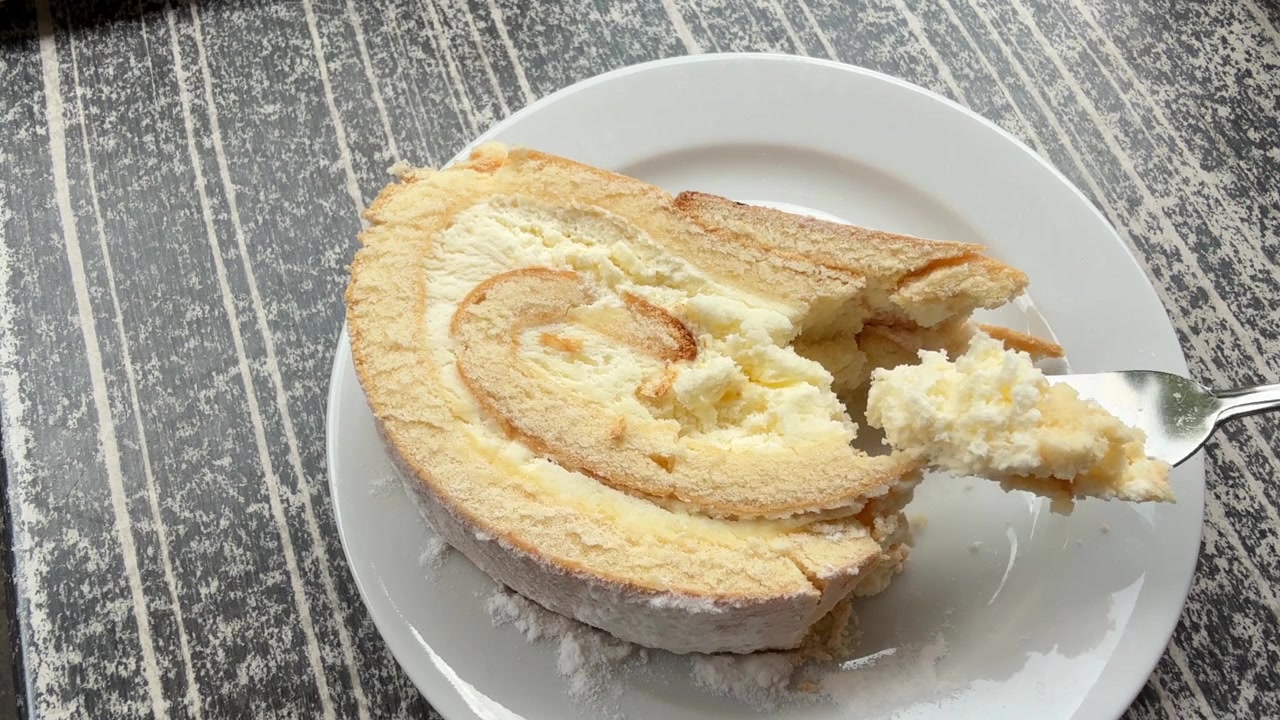 Eating spongy lemon cake pov
