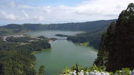 view of lagoa das sete cidades and lagoa azul fron miradouro da vista do rei in the san miguel, azores island, portugal on a sunny summer day