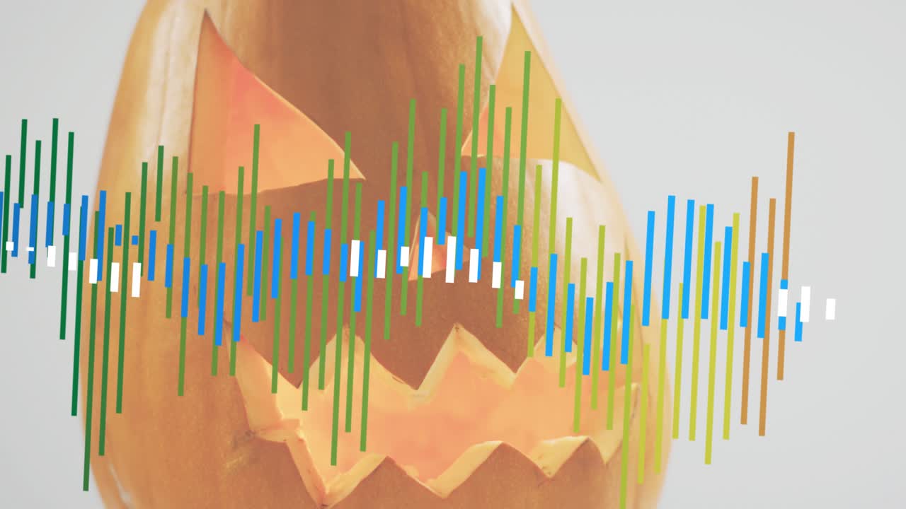 Avvio della riproduzione audio che lancia un'onda sonora crescente e pulsante accanto a una zucca intagliata, a indicare il suono.