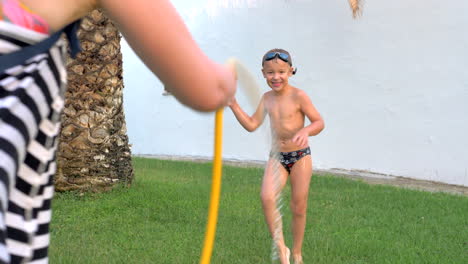 Water-fun-in-the-yard-on-hot-summer-day