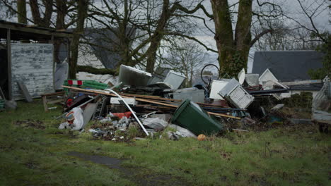 Pile-of-trash-with-trees-behind