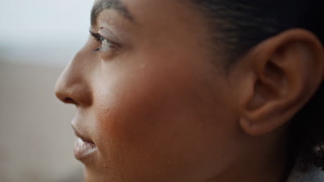 closeup pensive woman face in blurred background. beautiful african american