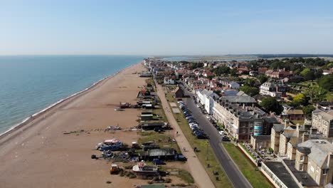 rising drone shot showing the sea front at aldeburgh, suffolk, uk. 21.06.25