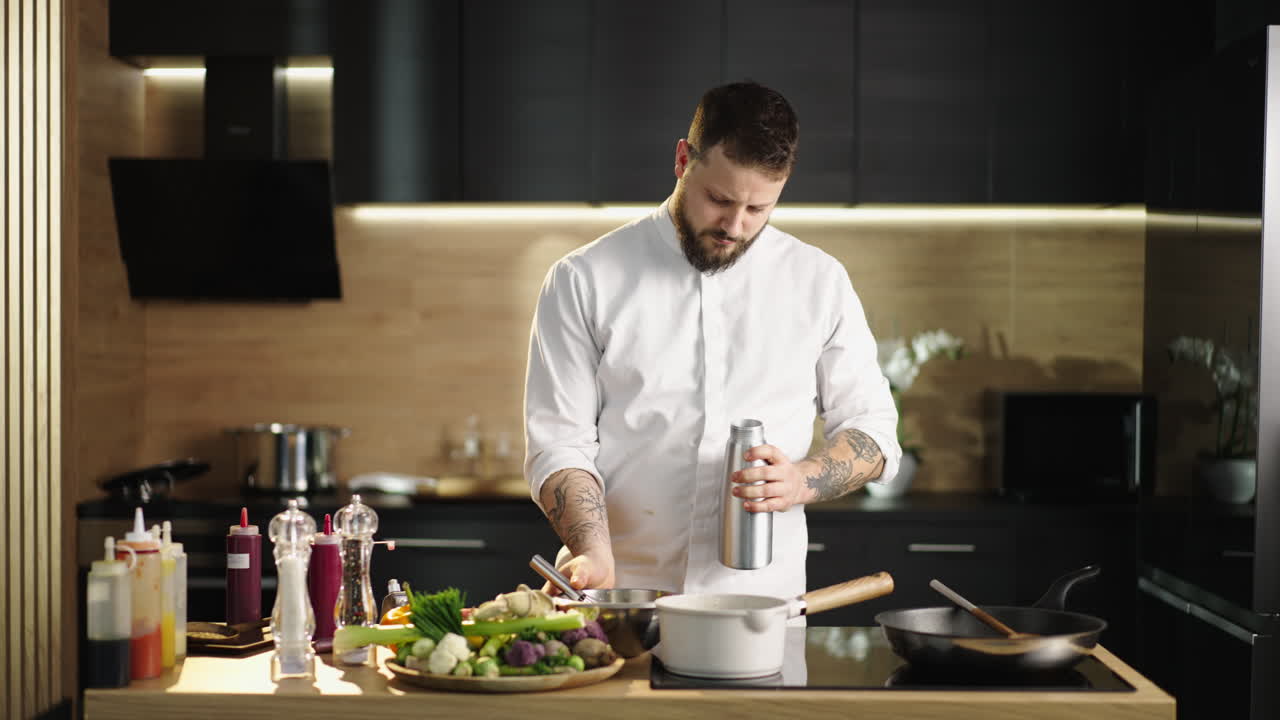 Chef preparing a meal in the kitchen