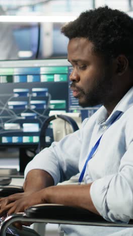 vertical video server room admin with disability interprets machine learning generated data