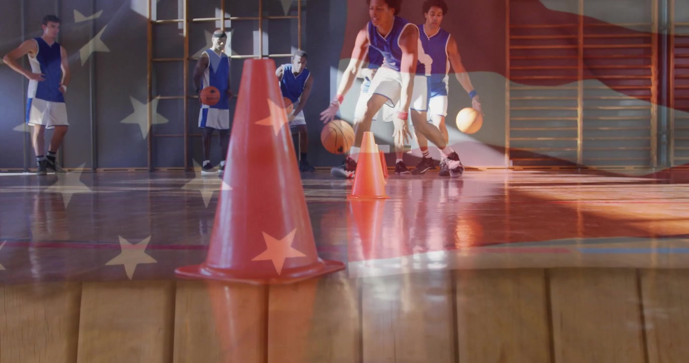 Team stepping forward starting sports drill, training dribbling around cones, flag overlaying court